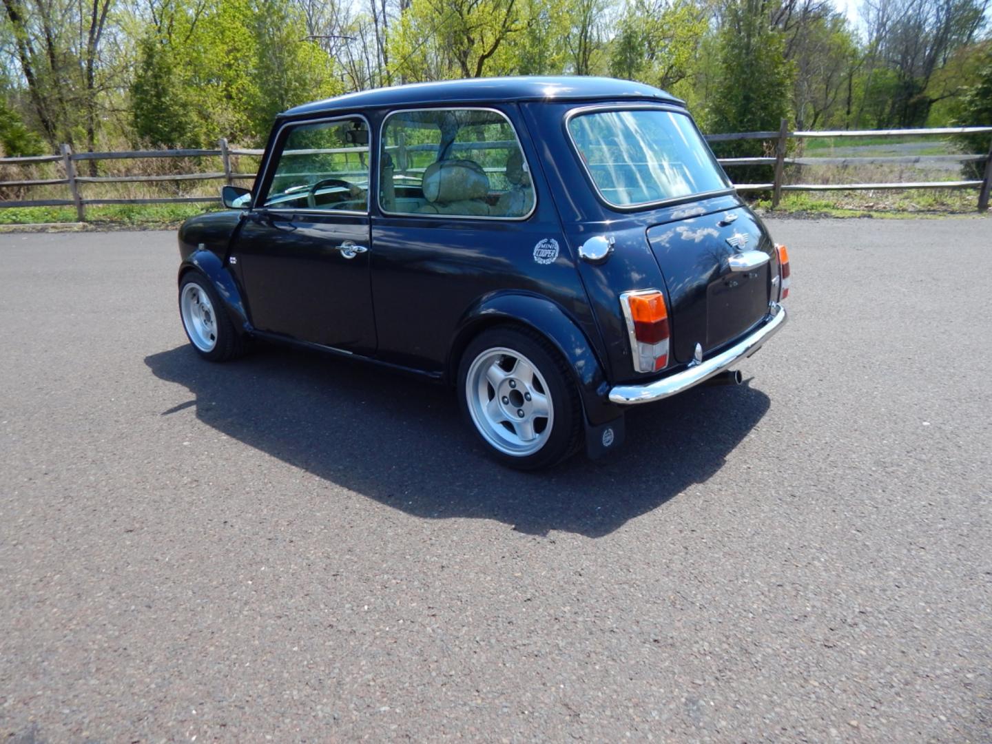 1984 Blue /Beige Leather Austin Mini Sport (A/A25751477) with an 1275cc 4 cylinder engine, Manual transmission, located at 6528 Lower York Road, New Hope, PA, 18938, (215) 862-9555, 40.358707, -74.977882 - The title to this car says she is a 1964, however in the sixties the door hinges were on the outside of the doors, also the windows in the sixties cars were sliding instead of roll up. We believe the year of this vehicle is 1984 due to the rear taillights. Here we have a beautifully restored A - Photo#5